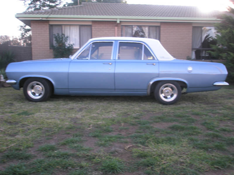 HR Holden in Grecian White over Hacienda Blue Metallic — Premier Sedan