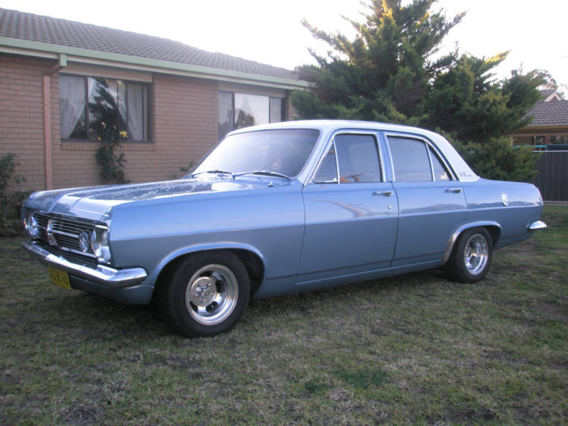 HR Holden in Grecian White over Hacienda Blue Metallic — Premier Sedan
