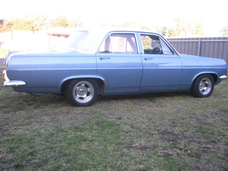HR Holden in Grecian White over Hacienda Blue Metallic — Premier Sedan