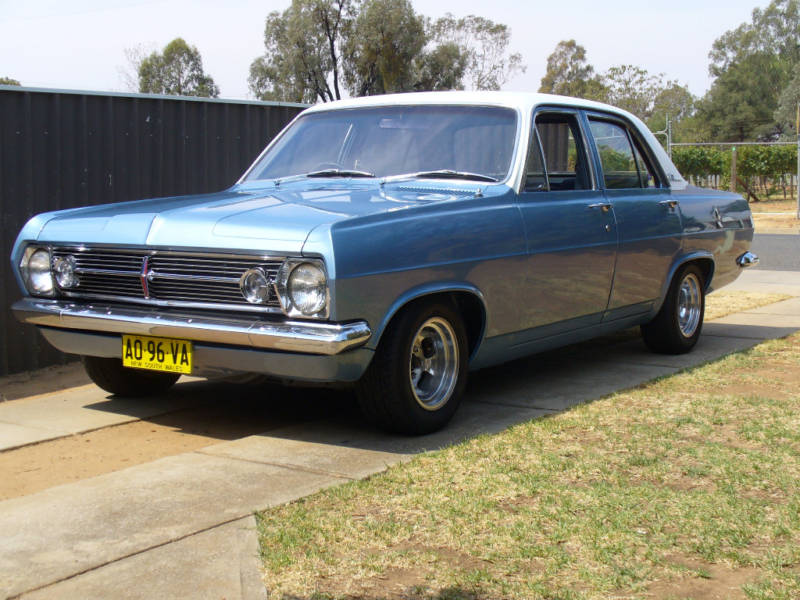 HR Holden in Grecian White over Hacienda Blue Metallic — Premier Sedan