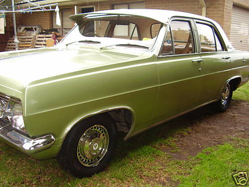 HR Holden in Grecian White over Sea Mist Jade Met — Premier Sedan