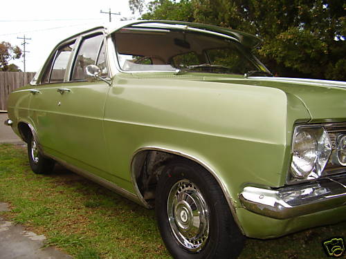 HR Holden in Grecian White over Sea Mist Jade Met — Premier Sedan