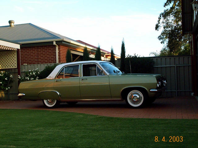 HR Holden in Grecian White over Sea Mist Jade Met — Premier Sedan