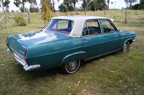 HR Holden in Grecian White over Tennyson Turquoise Met — Premier Sedan