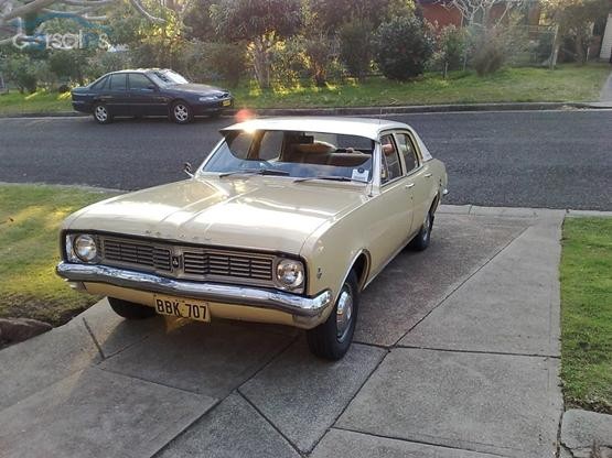 HT Holden in Kashmir White over Pharoah Gold — Kingswood Sedan