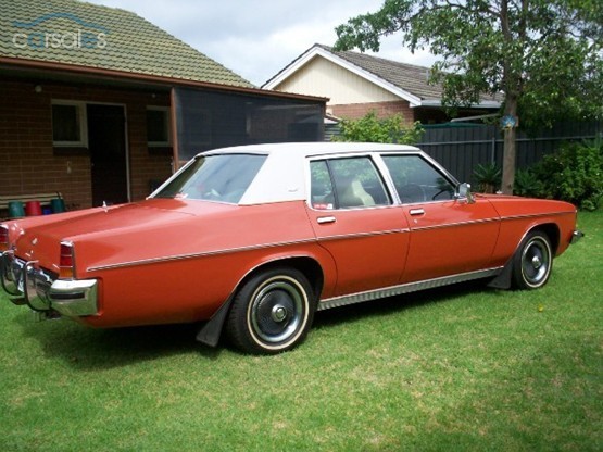 HX Holden in Cortez Red Met — Statesamn Caprice Sedan