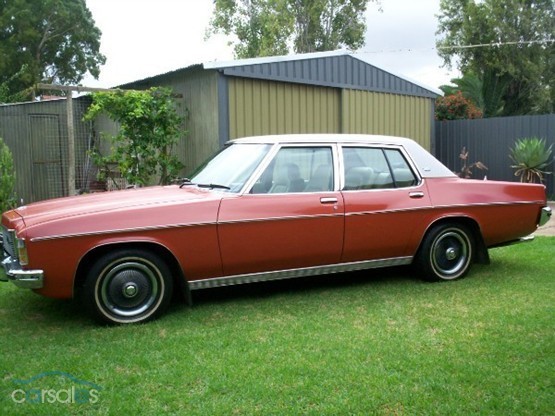 HX Holden in Cortez Red Met — Statesamn Caprice Sedan