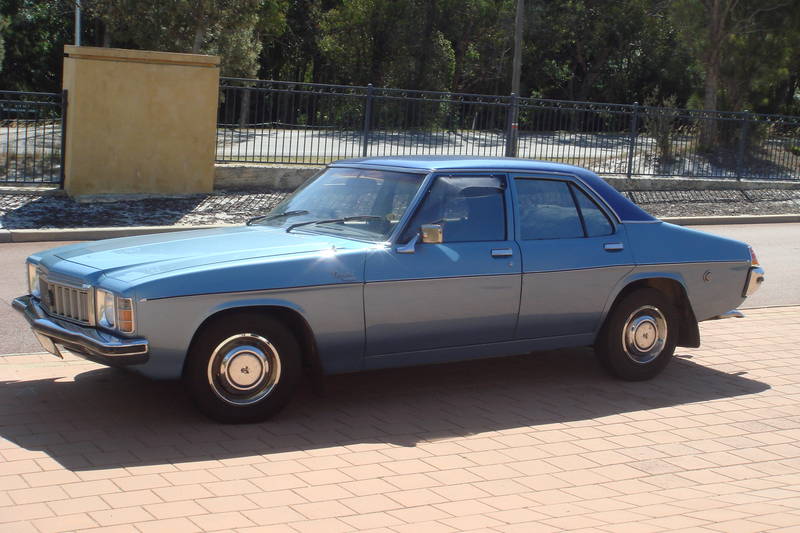HX Holden in Deauville Blue Met over Hacienda Blue Metallic — Kingswood Deluxe Sedan