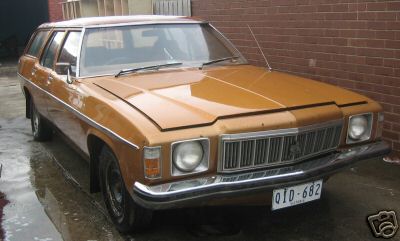 HX Holden in Anniversary Gold Met over Contessa Gold Met — 50th Anniversary Kingswood Station Wagon