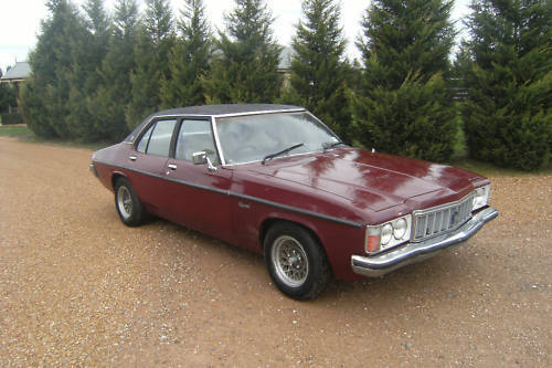 HX Holden in Bordeaux Red Met — Kingswood Sedan
