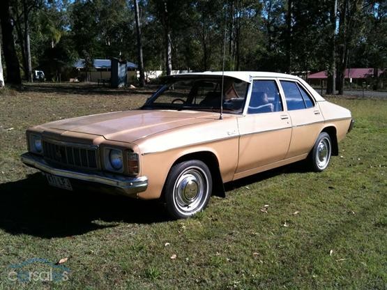 HX Holden in Cotillion White over Durham Beige — Kingswood Sedan