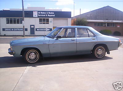 HX Holden in Deauville Blue Met over Hacienda Blue Metallic — Kingswood Sedan