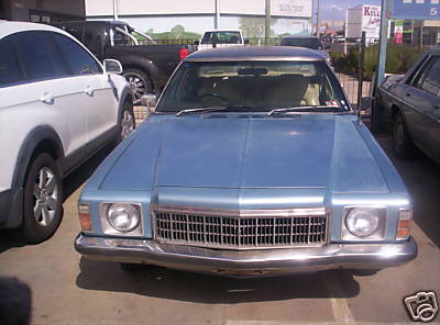 HX Holden in Deauville Blue Met over Hacienda Blue Metallic — Kingswood Sedan