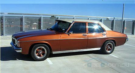 HX Holden in Antelope Met over Persian Sand Met — Premier Sedan