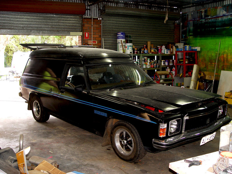 HX Holden in Tuxedo Black — Sandman Panel Van