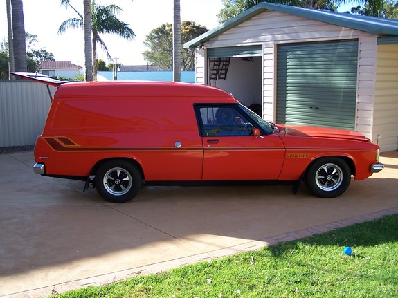 HX Holden in Mandarin Red — Sandman Panel Van