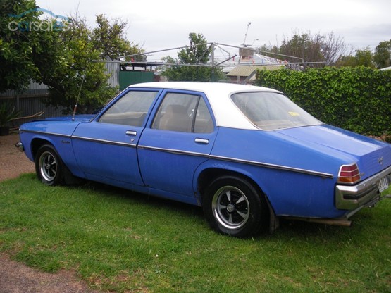HZ Holden in Palais White over Ultra Blue — Kingswood SL Sedan
