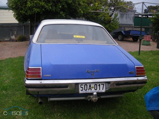 HZ Holden in Palais White over Ultra Blue — Kingswood SL Sedan