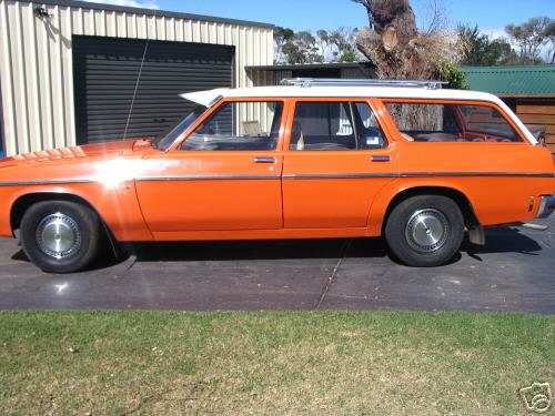HZ Holden in Palais White over Valencia Orange — Kingswood SL Station Wagon
