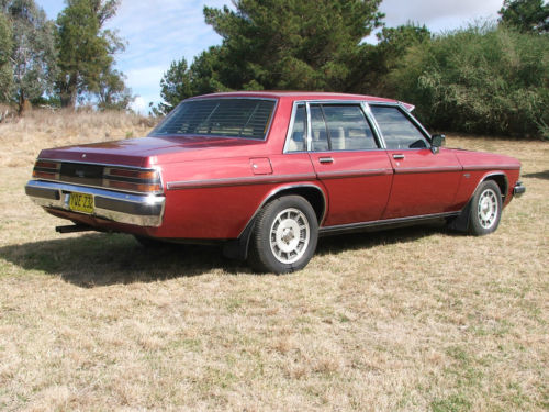 WB Holden in Venetian Red Met — Statesman DeVille Sedan
