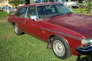 WB Holden in Venetian Red Met — Statesman DeVille Sedan