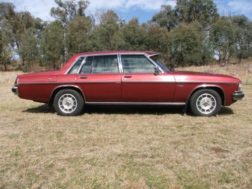 WB Holden in Venetian Red Met — Statesman DeVille Sedan