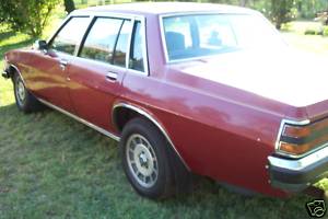 WB Holden in Venetian Red Met — Statesman DeVille Sedan