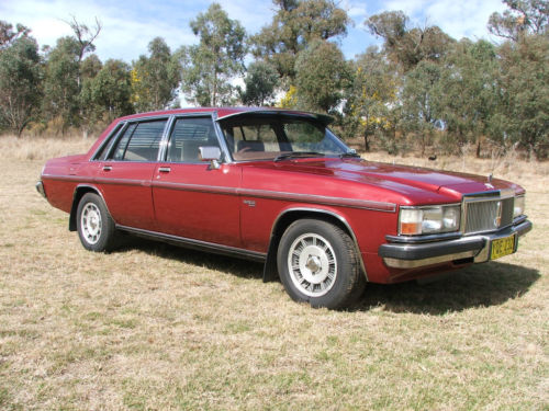 WB Holden in Venetian Red Met — Statesman DeVille Sedan