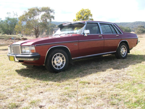 WB Holden in Venetian Red Met — Statesman DeVille Sedan
