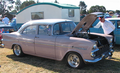 EK Holden in Snowcrest White over Cameo Beige — Special Sedan