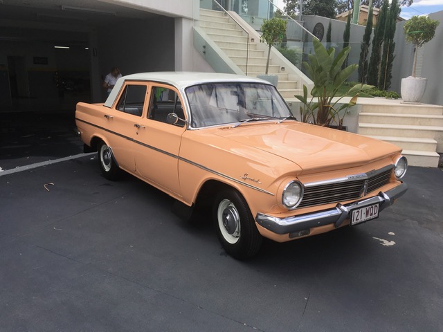 EH Holden in Fowlers Ivory over Quandong (peach) — Special Sedan