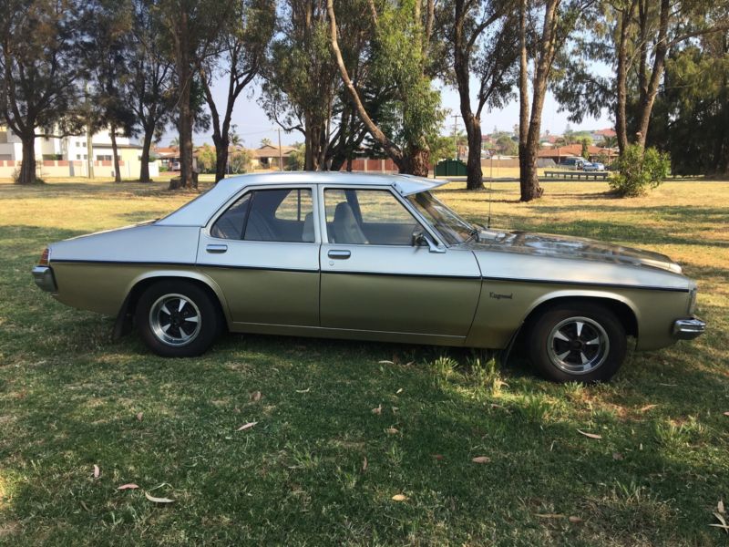 HJ Holden in Cotillion White over Antelope Met — Kingswood Sedan