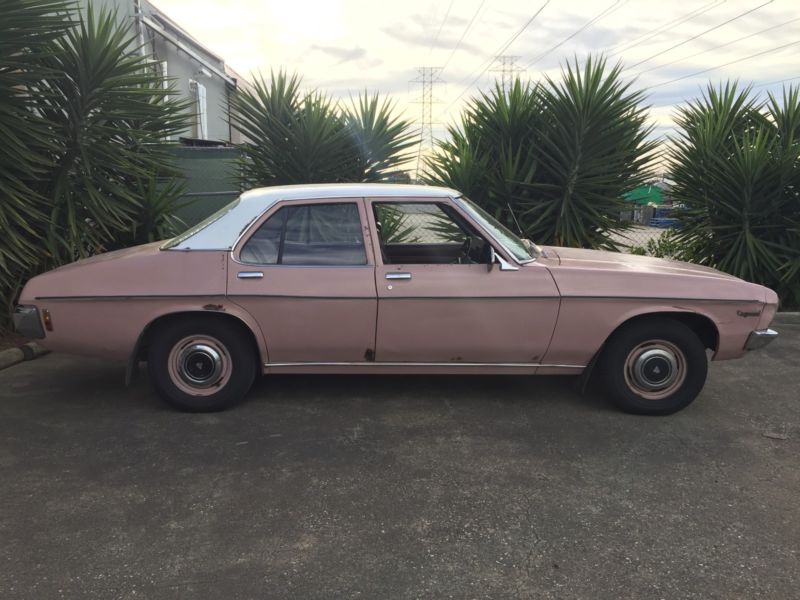 HQ Holden in Glacier White over Rose — Kingswood Sedan
