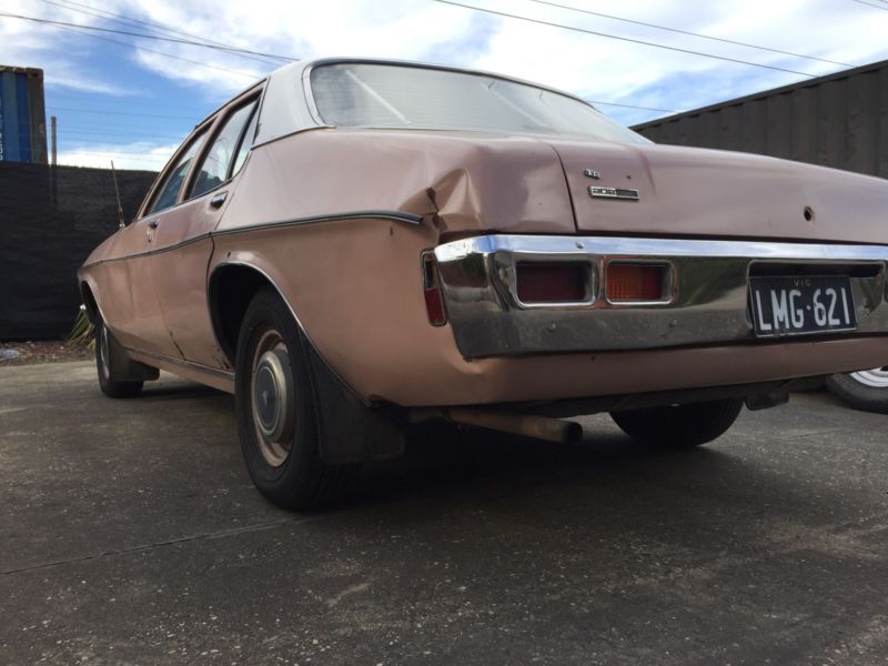 HQ Holden in Glacier White over Rose — Kingswood Sedan