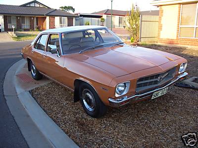 HQ Holden in Glacier White over Russet — Kingswood Sedan