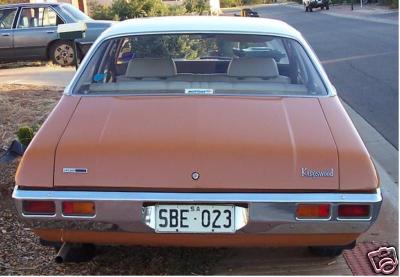 HQ Holden in Glacier White over Russet — Kingswood Sedan