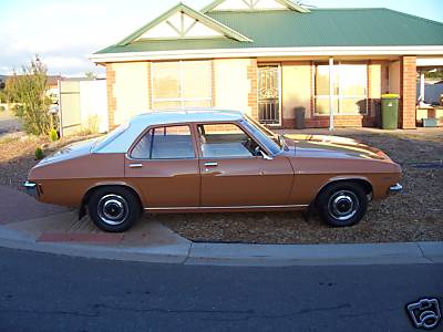 HQ Holden in Glacier White over Russet — Kingswood Sedan