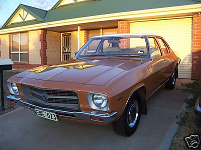 HQ Holden in Glacier White over Russet — Kingswood Sedan