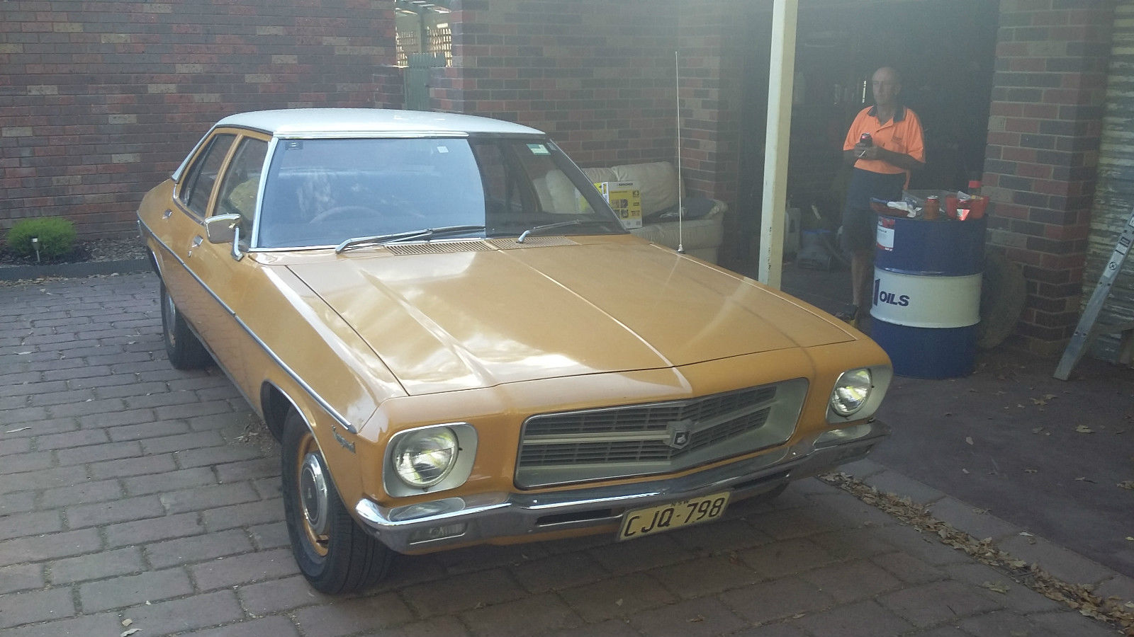 HQ Holden in Glacier White over San Remo Gold — Kingswood Sedan
