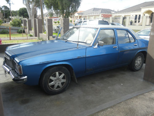 HX Holden in Antelope Met over Deauville Blue Met — 50th Anniversary Kingswood Sedan