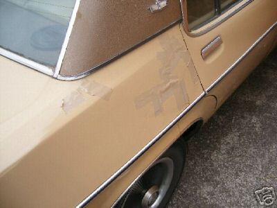 HX Holden in Sierra Tan Met over Buckskin — Statesamn Caprice Sedan