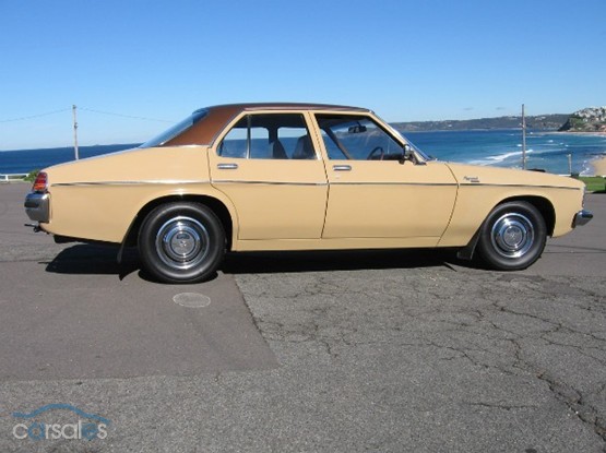 HX Holden in Sierra Tan Met over Buckskin — Kingswood Deluxe Sedan