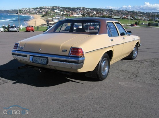 HX Holden in Sierra Tan Met over Buckskin — Kingswood Deluxe Sedan
