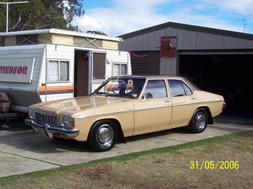 HX Holden in Sierra Tan Met over Buckskin — Kingswood Deluxe Sedan