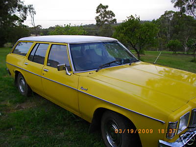 HX Holden in Cotillion White over Absinth Yellow — Kingswood Station Wagon