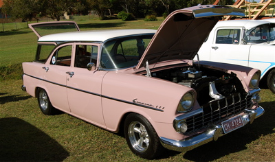 EK Holden in Snowcrest White over Cameo Beige — Special Station Sedan
