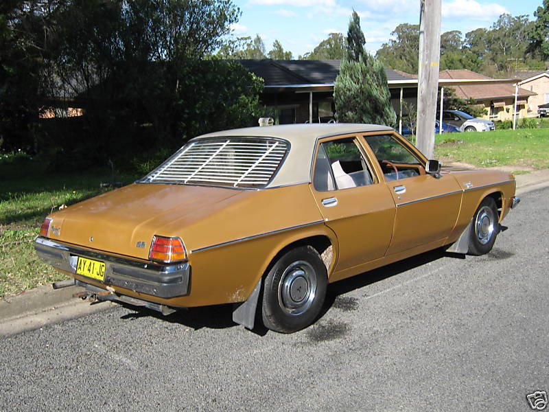 HX Holden in Sepia Met over Contessa Gold Met — Kingswood Sedan