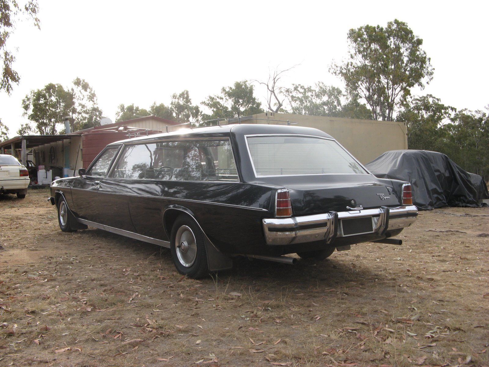 HX Holden in Tuxedo Black — Kingswood Station Wagon