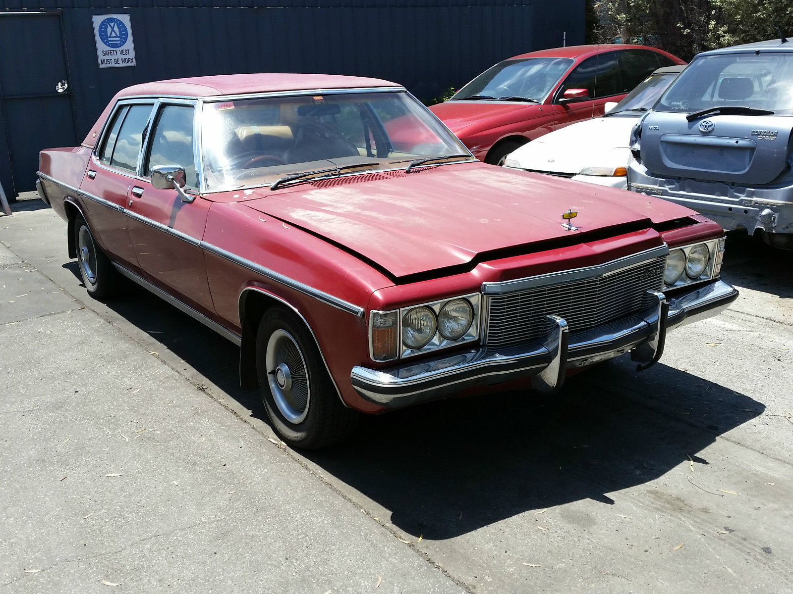 HZ Holden in Cortez Red Met — Statesman Caprice Sedan
