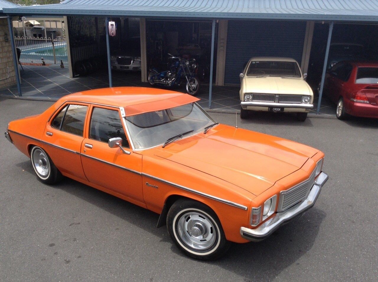 HZ Holden in Valencia Orange — Kingswood SL Sedan